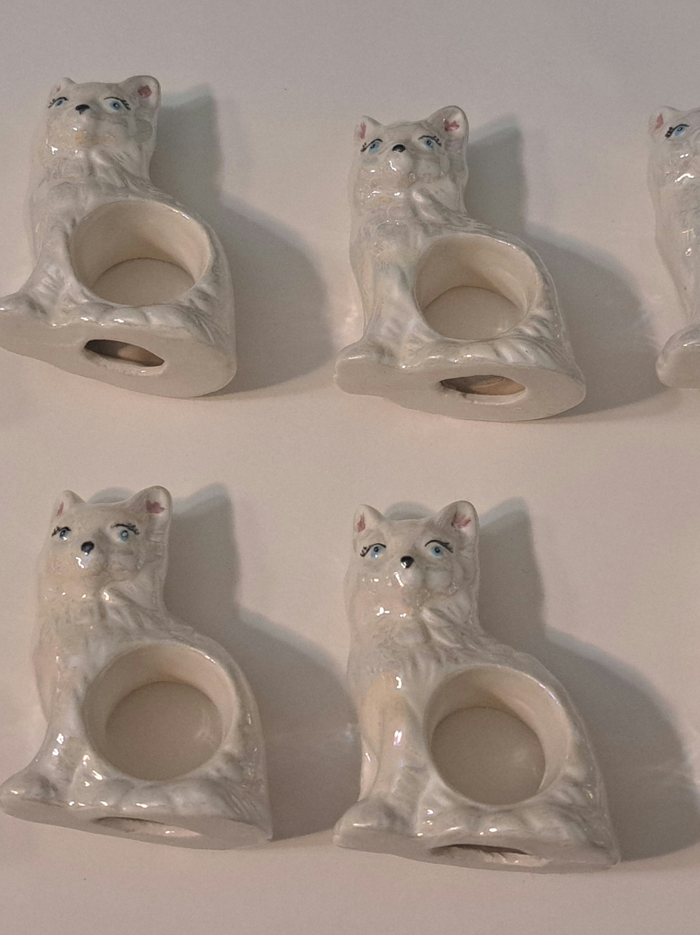 Set Of 8 Vintage  Porcelain Ceramic Cat Napkin Rings feature Iridescent Glaze
